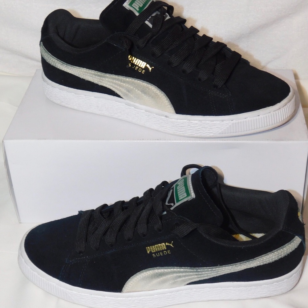 Black suede classic pumas